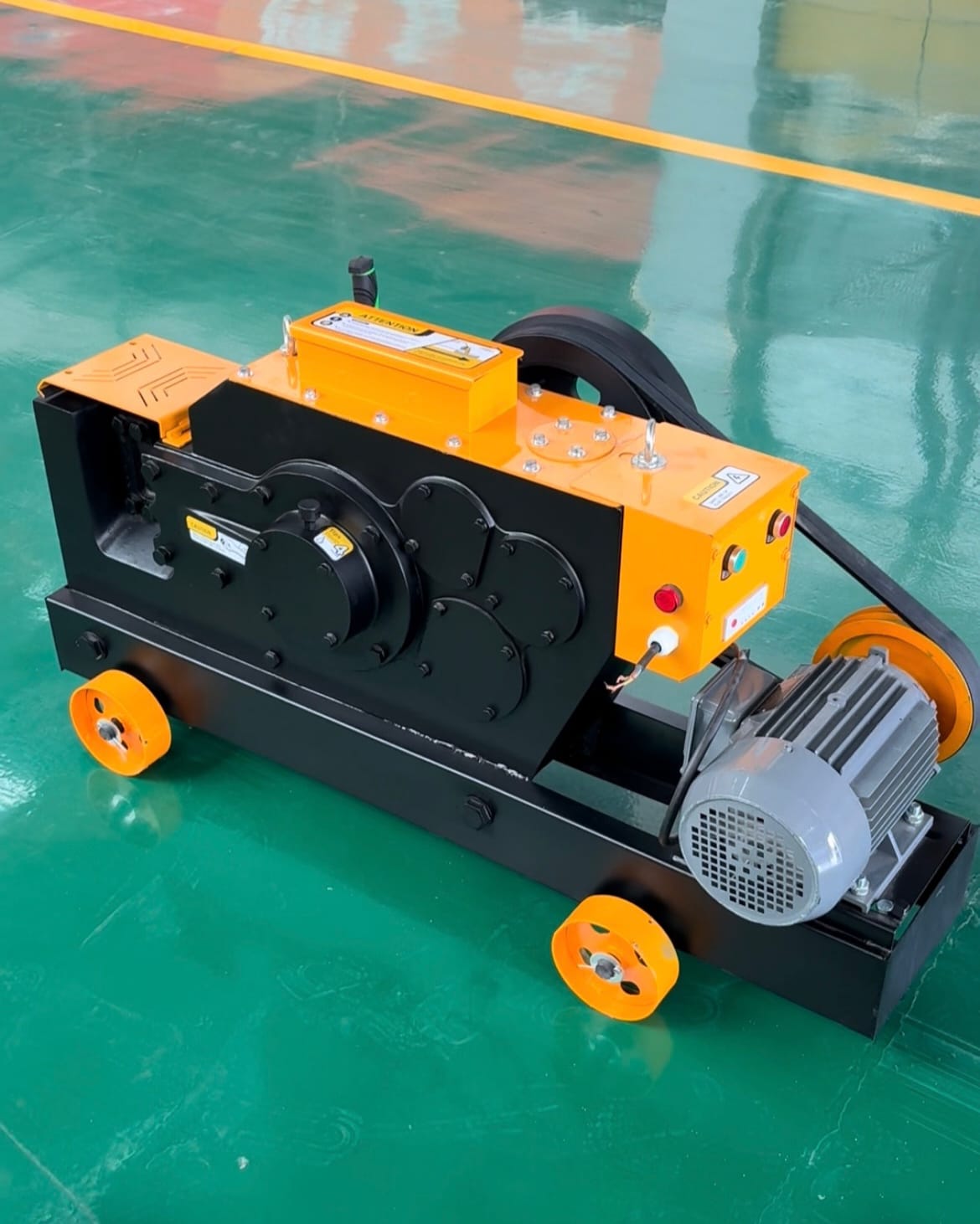 Industrial machine with wheels and motor